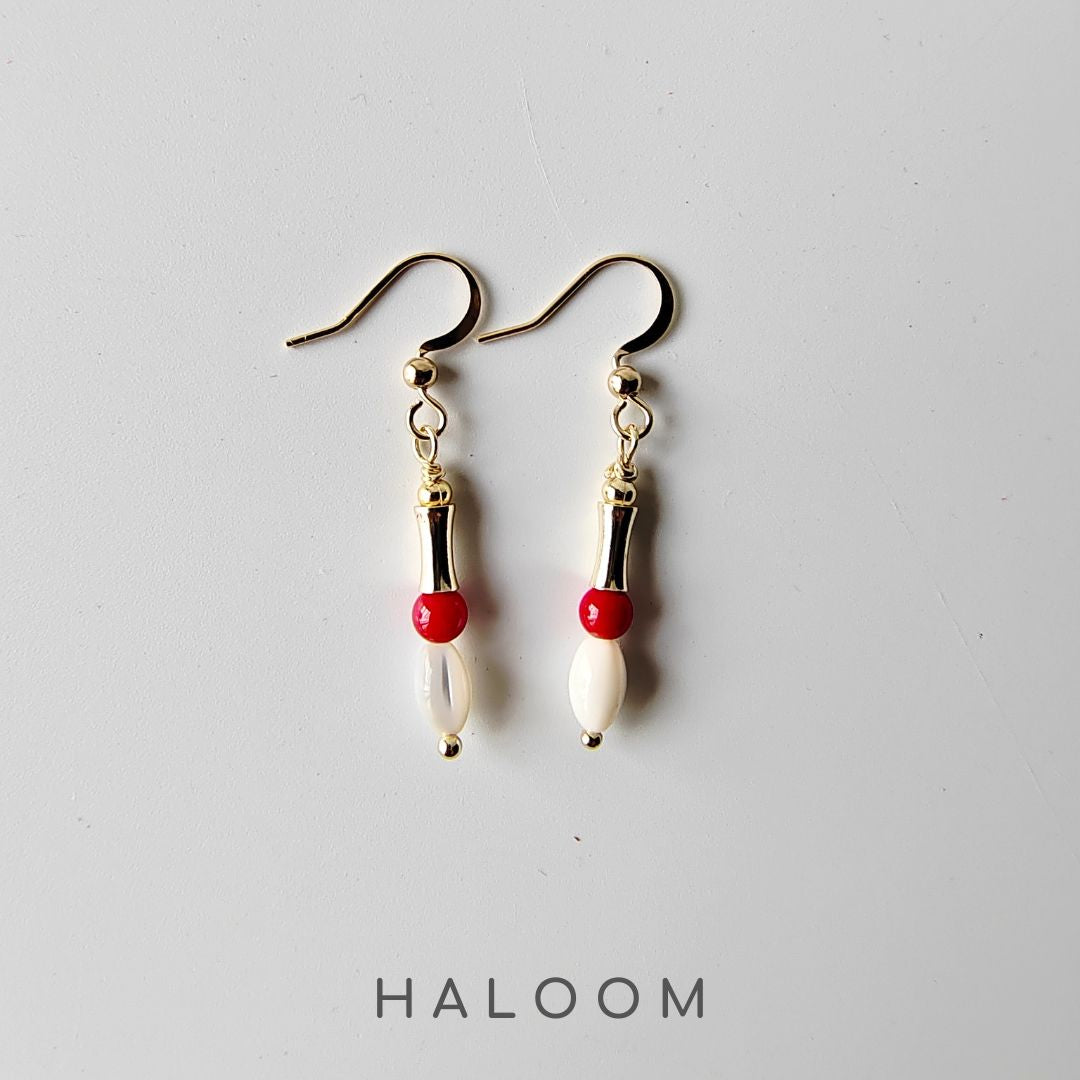 Courageous Heart earrings with shell
