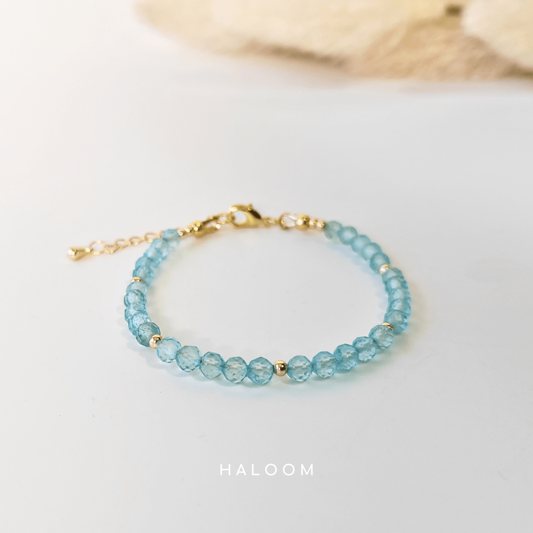 Faceted blue topaz December birthstone bracelet