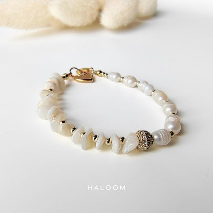 Freshwater pearl and shell bracelet.