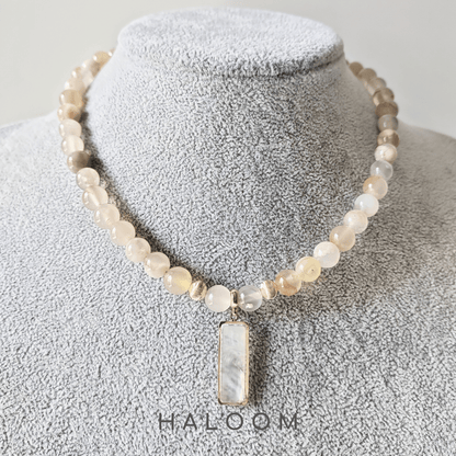 Blush & Bloom sakura agate necklace.