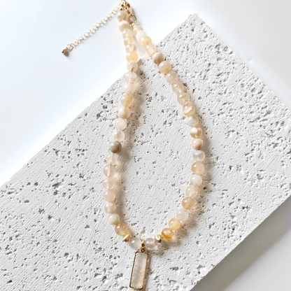 Blush & Bloom sakura agate necklace.