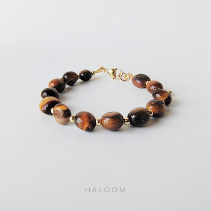 Strength & Confidence tiger's eye bracelet (~8mm).